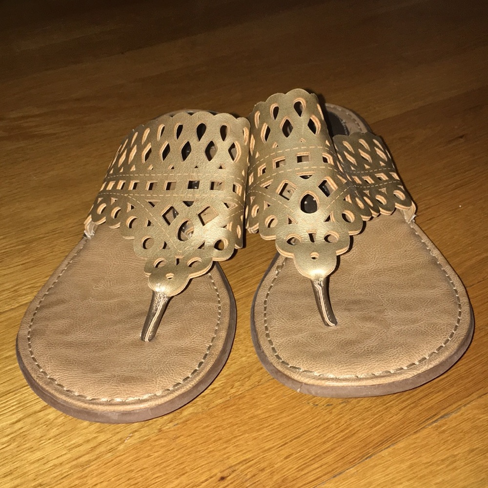 Born concept gold sandals